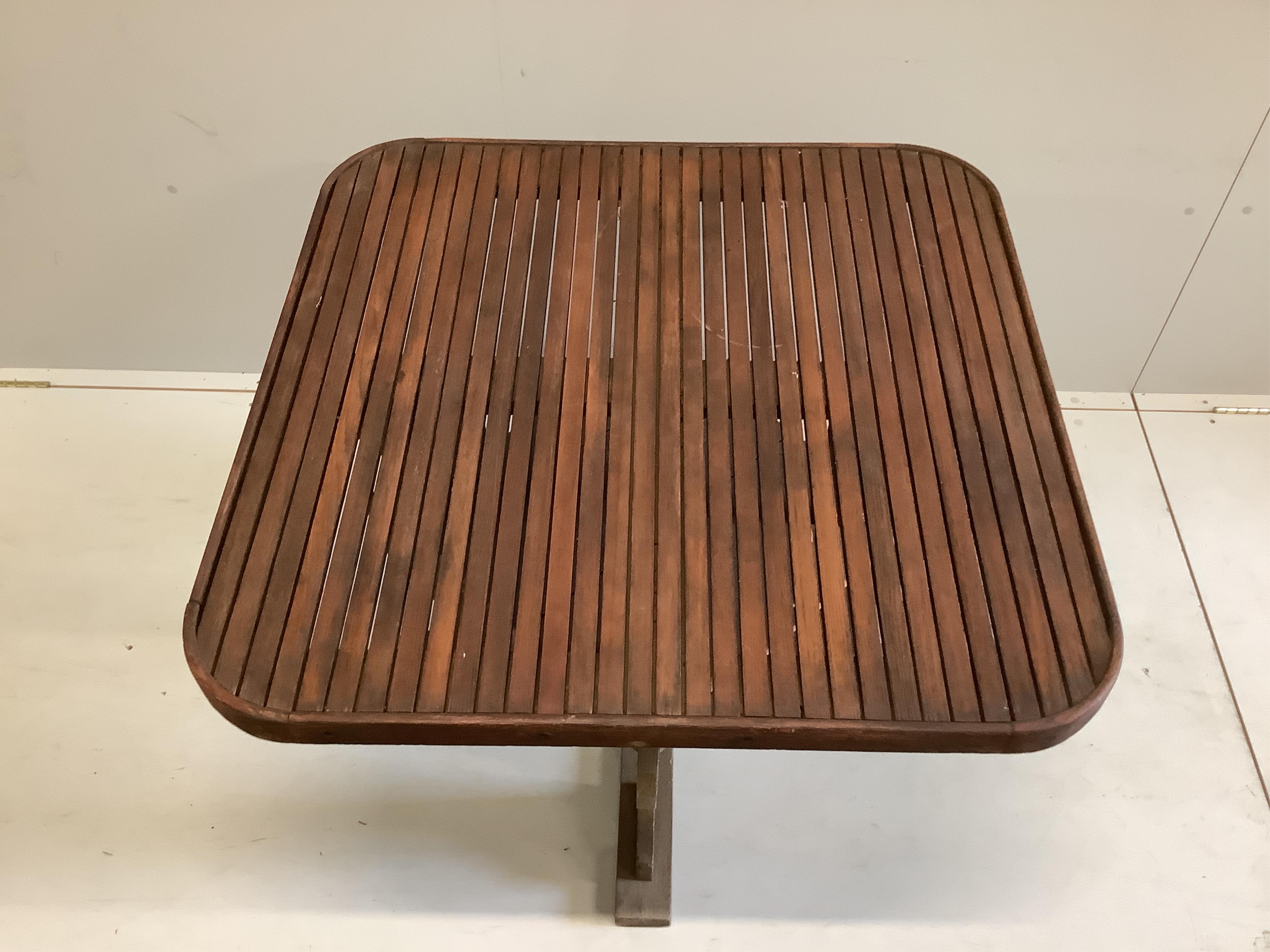 Hughes Bolckow for Heals, a square teak garden table, width 102cm, height 70cm and four chairs
